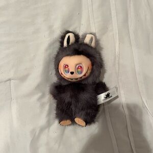 Furry Black Plush Toy with Colorful Eyes